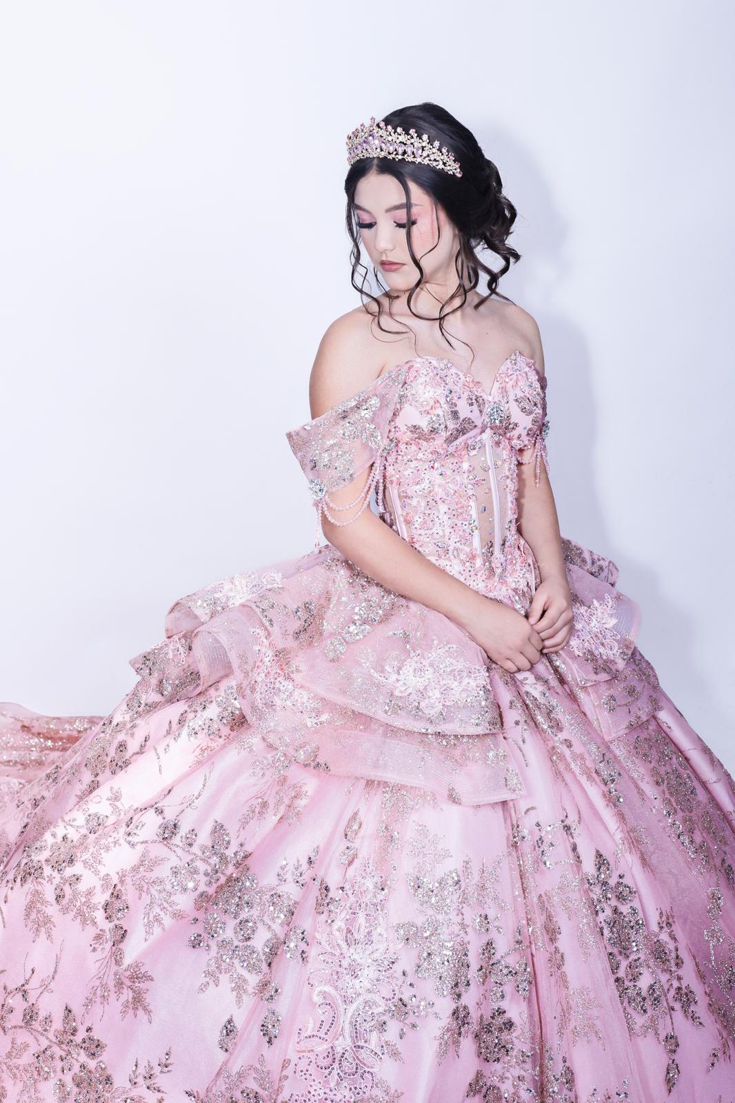 Aneth Rodriguez in her pink and silver quinceañera gown with a tiara